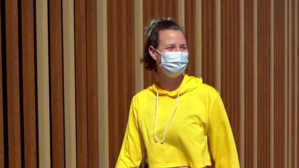 Young Gorgeous Spanish Girl Wearing Face Mask Yellow Crop Top — ストック動画