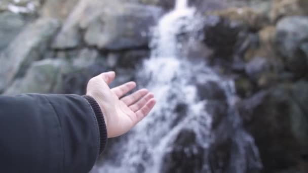 Male Hand Front Small Waterfall Forest — Stockvideo