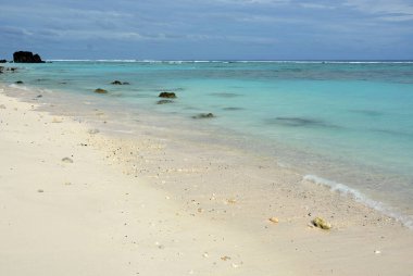 A mesmerizing view of a beautiful sandy beach in Guayacanes, Dominican Republic clipart
