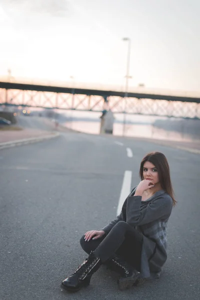 Vertical Shot Young Caucasian Female Sitting Road — Fotografia de Stock