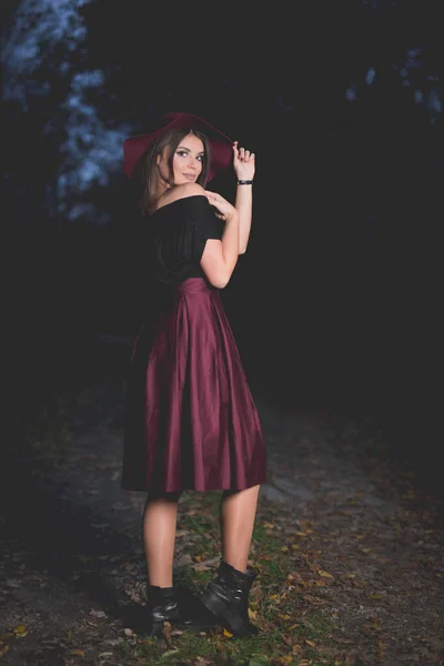 Vertical Shot Young Caucasian Female Burgundy Skirt Hat Posing Park —  Fotos de Stock