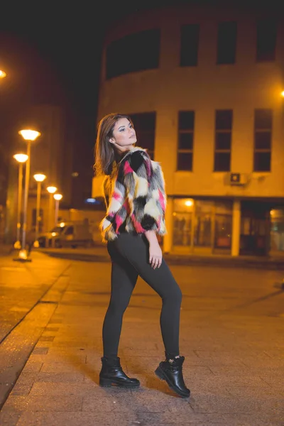 Vertical Shot Sexy Caucasian Woman Fluffy Colorful Jacket Posing Street — Zdjęcie stockowe