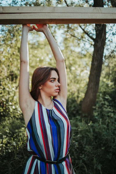 Vertical Shot Young Caucasian Female Colorful Dress Posing Outdoors — 스톡 사진