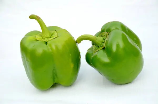 Two Ripe Green Capsicums Bell Peppers Isolated White Background — Stock Photo, Image