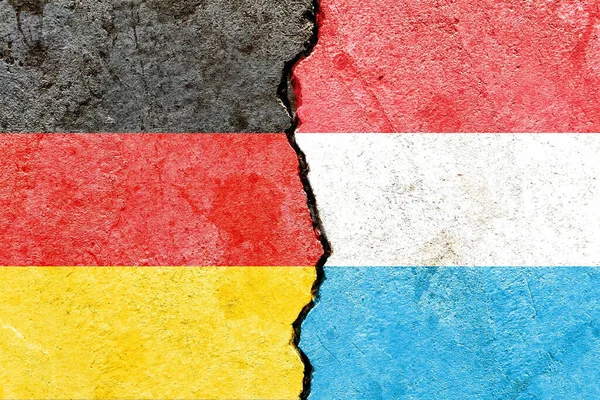 Flags Germany Luxembourg Cracked Wall Background — Stock Photo, Image