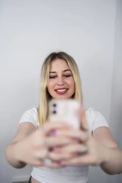 Verticals Hot Blonde Spanish Female Taking Selfie White Background — Foto de Stock