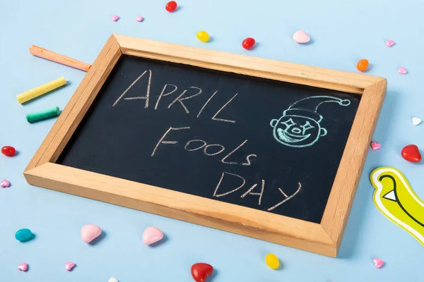 Closeup April Fools Day Written Small Blackboard Candies Chalk Blue — Stock Photo, Image