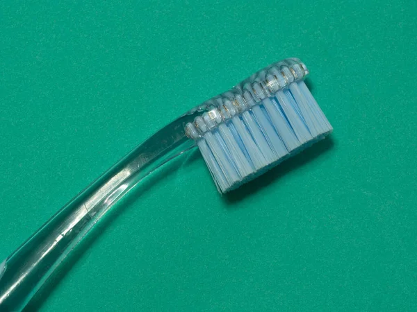 Top View Shot Lying Blue Toothbrush Green Background — Stock Photo, Image