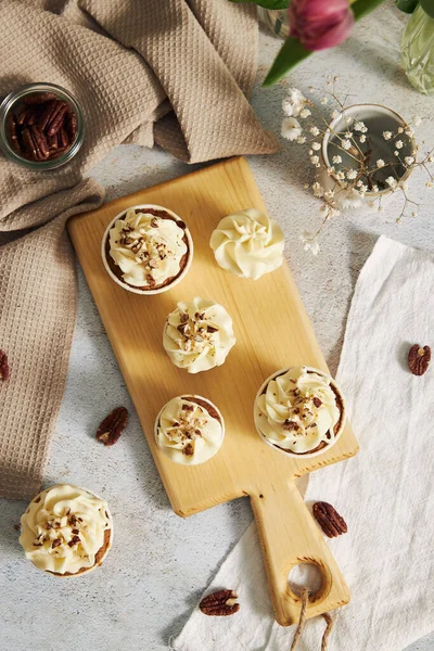 Top View Delicious Carrot Cupcakes Whipped Cream Topping Nuts — Stock Photo, Image