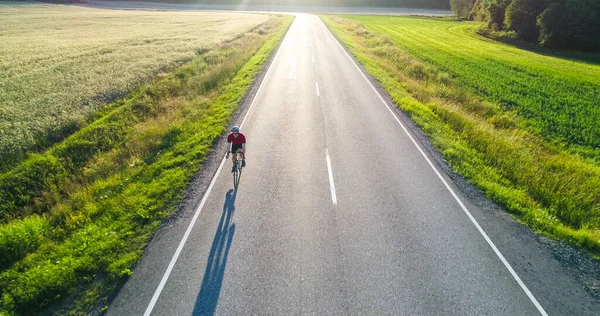 Man Biking Countryside Aerial View Biker Driving Road Wheat Fields — Stock Photo, Image