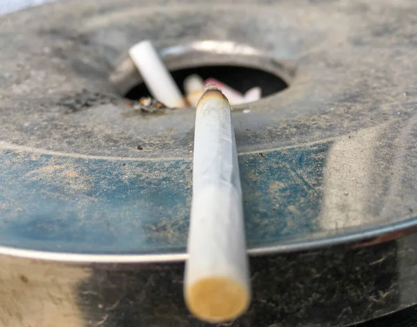 Closeup Used Cigarette Butt Metal Ashtray —  Fotos de Stock