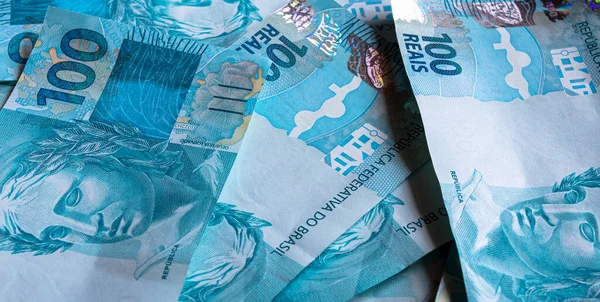 Banda Roztroušených Brazilských 100 Reals Peníze Tapety — Stock fotografie