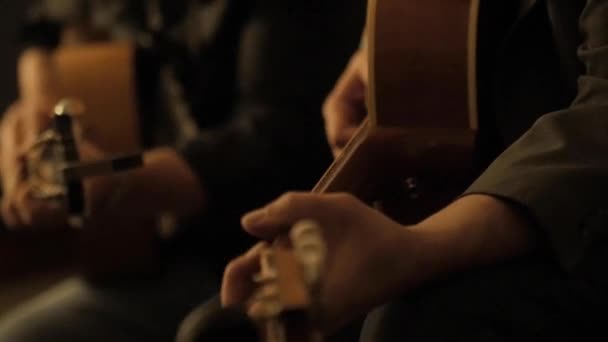 Male Hands Playing Guitars Dark Room Close View — Stock Video