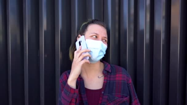 Slow Motion Spanish Woman Wearing Face Mask While Talking Phone — Stockvideo