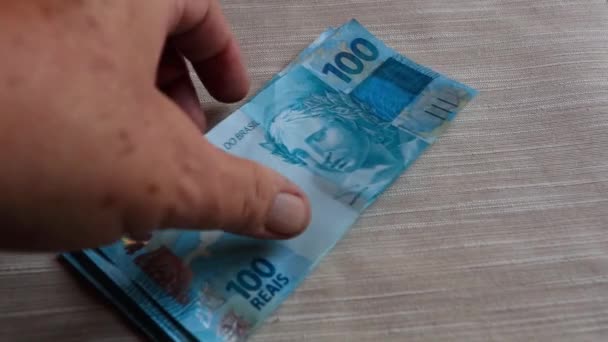 Крупный План Бразильских Банкнот Подсчет Денег — стоковое видео