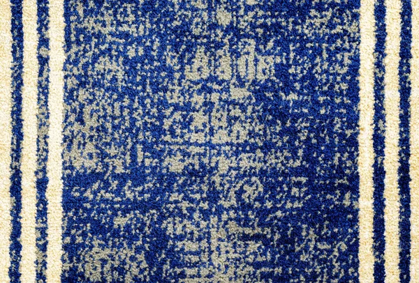 一条有白线的蓝色软布地毯 — 图库照片