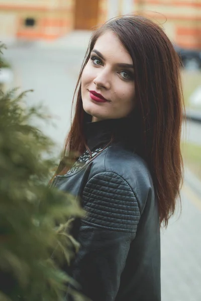 Beautiful Caucasian Female Red Lipstick Leather Coat Posing Outdoors — стоковое фото