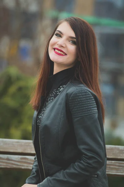 Vertical Portrait Young Brunette Female Leather Coat Posing Sitting Bench — ストック写真