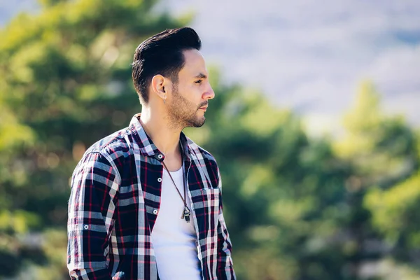 Side View Pensive Attractive Spanish Man Posing Natural Background — ストック写真