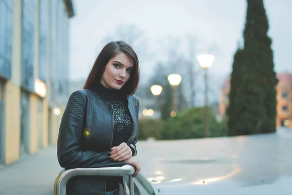 Young Brunette Female Leather Jacket Posing Leaning Railing Street — стоковое фото