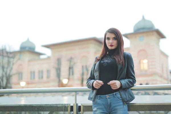 Young Brunette Female Leather Jacket Leaning Railing Front Historic Building — стоковое фото