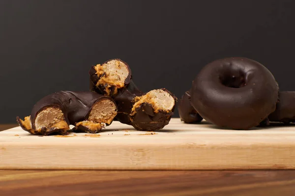 Closeup Chocolate Donuts Wooden Board — Stock Photo, Image