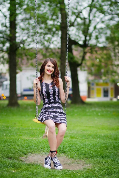 Beautiful Caucasian Female Red Lipstick Sitting Park Swing — ストック写真