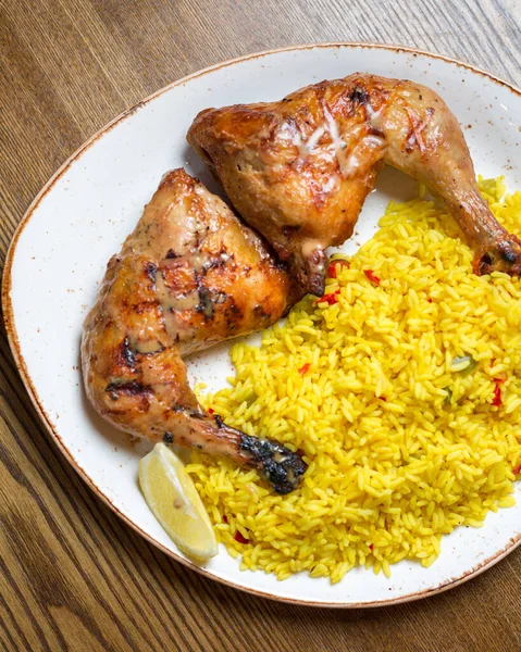 Vertical Top View Roasted Chicken Legs Yellow Rice — Stock Photo, Image