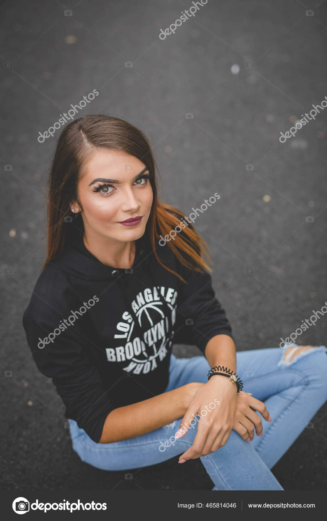 High Angle Shot Young Female Casual Clothes Posing Sitting Road Stock Photo  by ©Wirestock 465814046