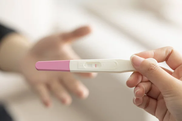 Closeup Woman Hand Holding Pregnancy Test Kit Negative Result — Stock Photo, Image