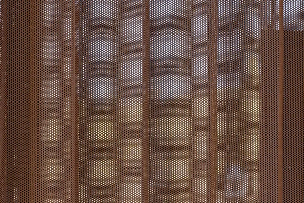 Closeup Perforated Metal Texture Stock Photo by ©Wirestock 473192598