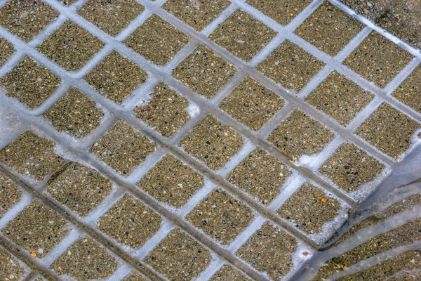 Vysokoúhlý Záběr Betonové Podlahy Mýdlovými Vodními Cestami — Stock fotografie