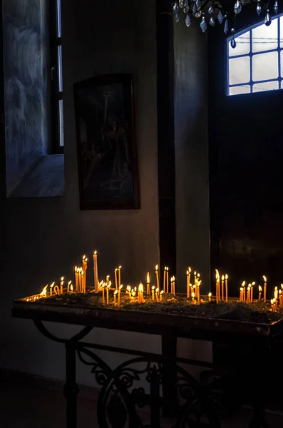 Vertical Shot Lit Votive Candles Church Dead Loved — Stock Photo, Image