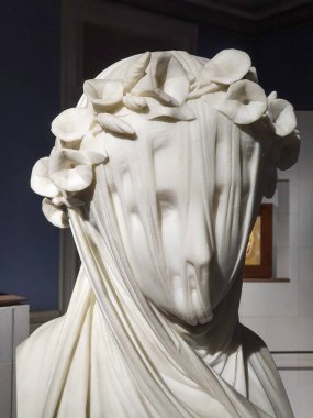 A white marble sculpture of a young Veiled Lady by Raffaele Monti in the Gallery of Modern Art, Milan clipart