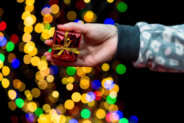 Person Holding Christmas Tree Decorations Bokeh Lights Background — Stock Photo, Image