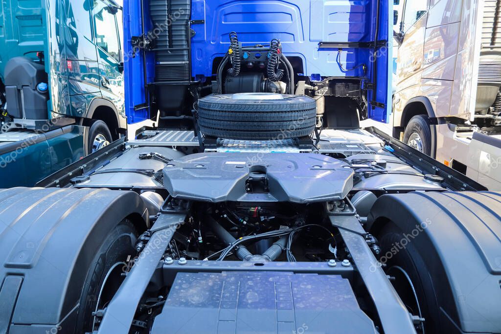 KIEL, GERMANY - Apr 16, 2021: Close up view at new Volvo trucks waiting at a parking area