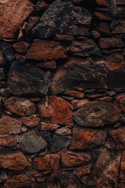 Eski Yıpranmış Taş Bir Duvarın Dikey Görüntüsü — Stok fotoğraf