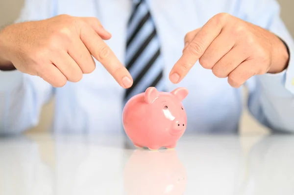 Closeup Businessman Pointing Piggy Bank — Stock Photo, Image