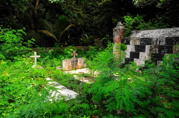 The monumental tomb of the wealthy Hossein family, built in the forest in La Digue Island