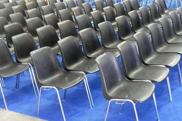 Empty Meeting Room Rows Black Plastic Chairs — Stock Photo, Image