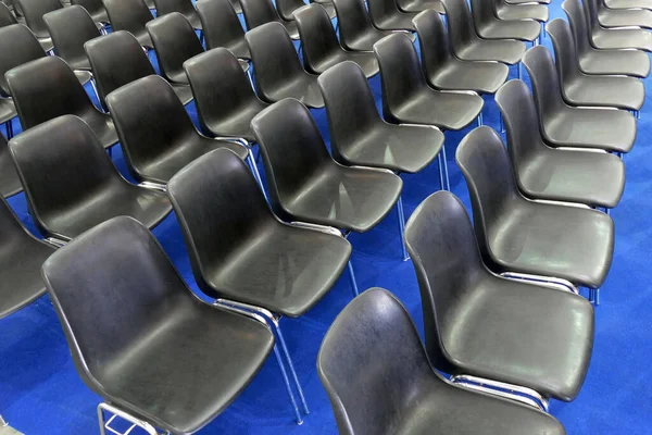 High Angle Shot Rows Black Plastic Chairs Empty Conference Hall — Stock Photo, Image