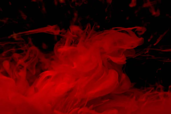 Closeup Shot Red Smoke Black Isolated Background — Stock Photo, Image