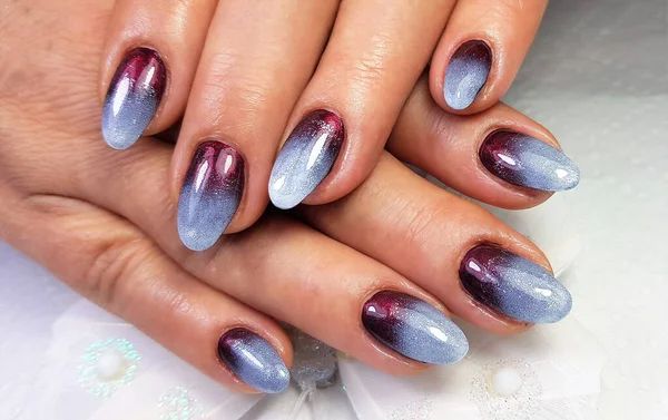 a close-up with a gel manicure painted on the nails