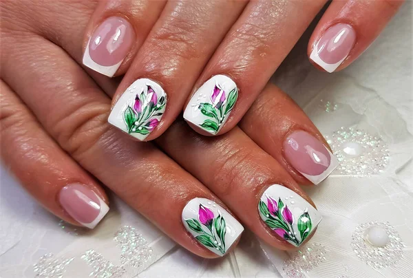 a close-up with a gel manicure painted on the nails