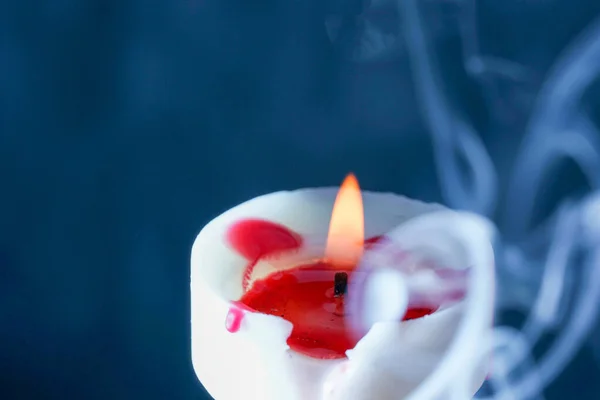 Closeup Burning Candle Smoke Isolated Blue Background — Stock Photo, Image