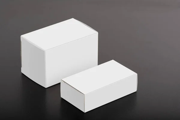 Two Pillbox Packages Black Table — 图库照片