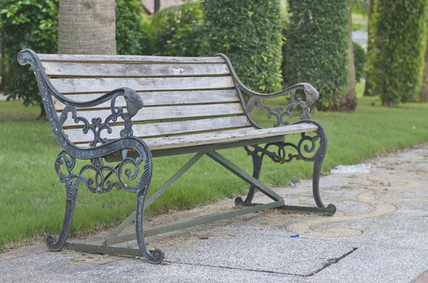 Closeup Vintage Empty Park Bench Metal Legs Armrests — Stock Photo, Image