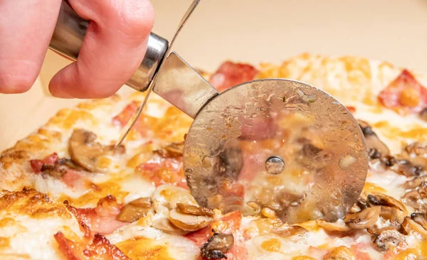 Closeup Person Cutting Delicious Pizza Bacon Cheese Mushrooms Sauces Wheel — Stock Photo, Image