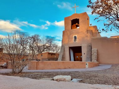 San Miguel Mission Chapel in Santa Fe, New Mexico. Adobe church built in the 17th century. The oldest church in the USA. clipart