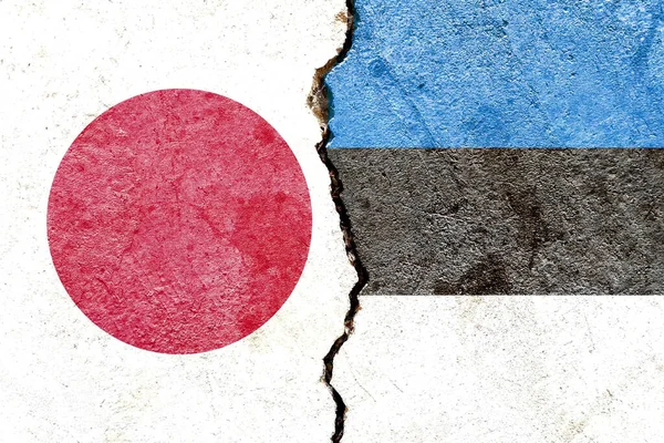 Vlaggen Van Japan Estland Geschilderd Gebarsten Muur Achtergrond Politiek Conflicten — Stockfoto